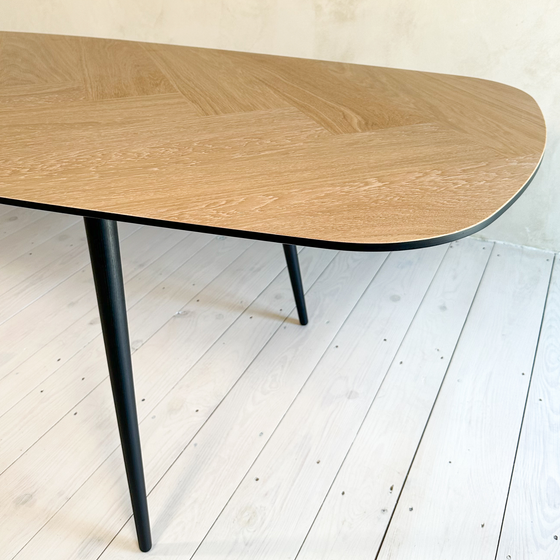 Elevate Oval Oak Wood Herringbone dining table